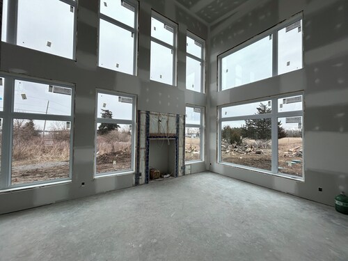 Luxury modern farmhouse on Amherst Island. 152 acres of private, scenic trails.