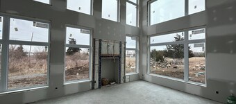 Luxury modern farmhouse on Amherst Island. 152 acres of private, scenic trails.