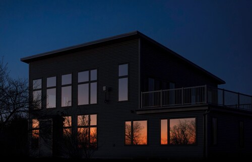 Luxury modern farmhouse on Amherst Island. 152 acres of private, scenic trails.