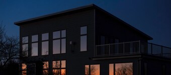 Luxury modern farmhouse on Amherst Island. 152 acres of private, scenic trails.