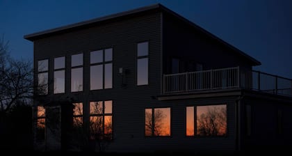 Luxury modern farmhouse on Amherst Island. 152 acres of private, scenic trails.