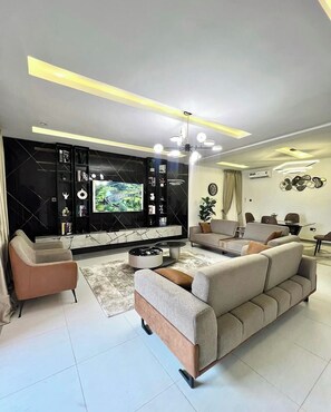 Economy Room, Balcony, City View | Living area - Julirose Hotel And Suites (Port Harcourt)