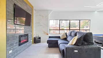 Appartement | Coin séjour | Télévision à écran plat