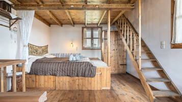 Tabla de planchar con plancha, wifi y ropa de cama