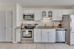 Fridge, microwave, oven, stovetop - Seaview 6: Oceanview Condo in Kure Beach (Kure Beach)