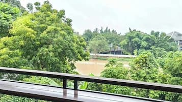 Family Room, River View | Property grounds