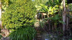 A stone wall with a sign reading "POLDHIL". - Poldhu -  Pet Friendly - Free parking and WiFi (Buryas Bridge)