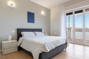 2 habitaciones y tabla de planchar con plancha 