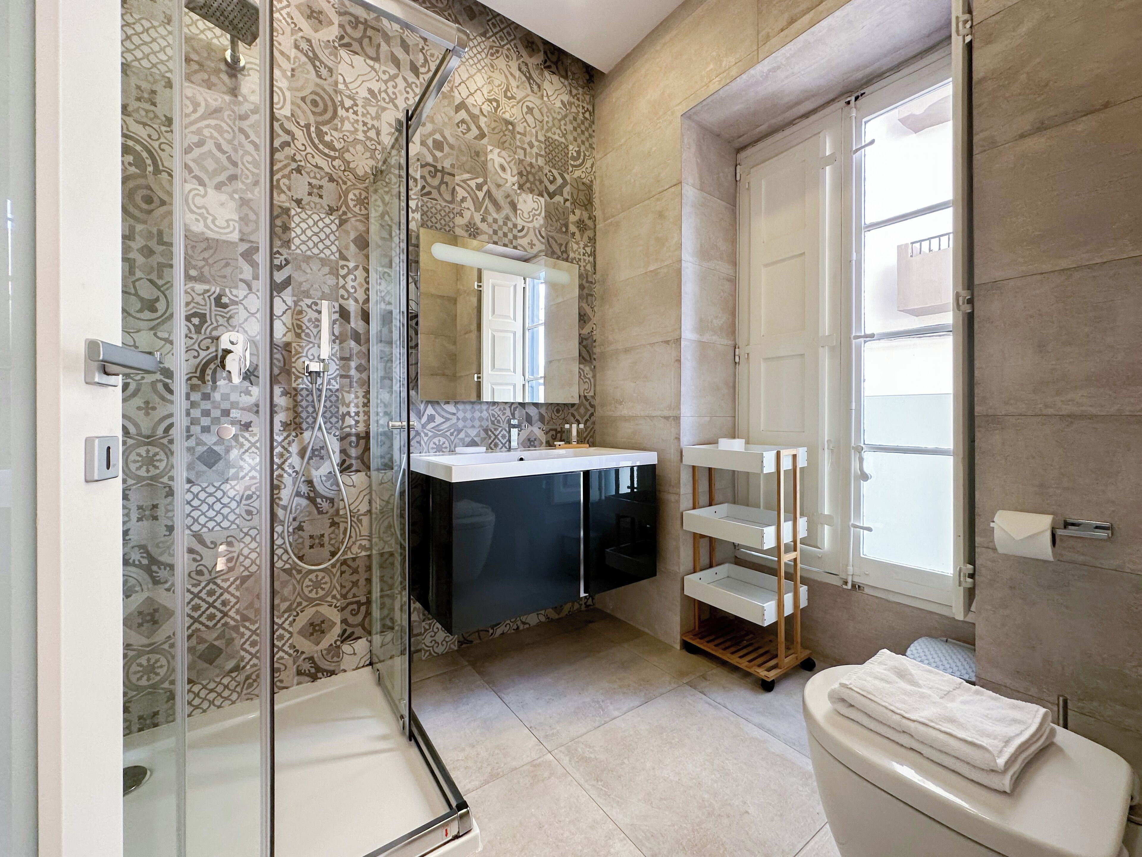 Basic Apartment, City View | Bathroom | Rainfall showerhead, free toiletries, hair dryer, soap