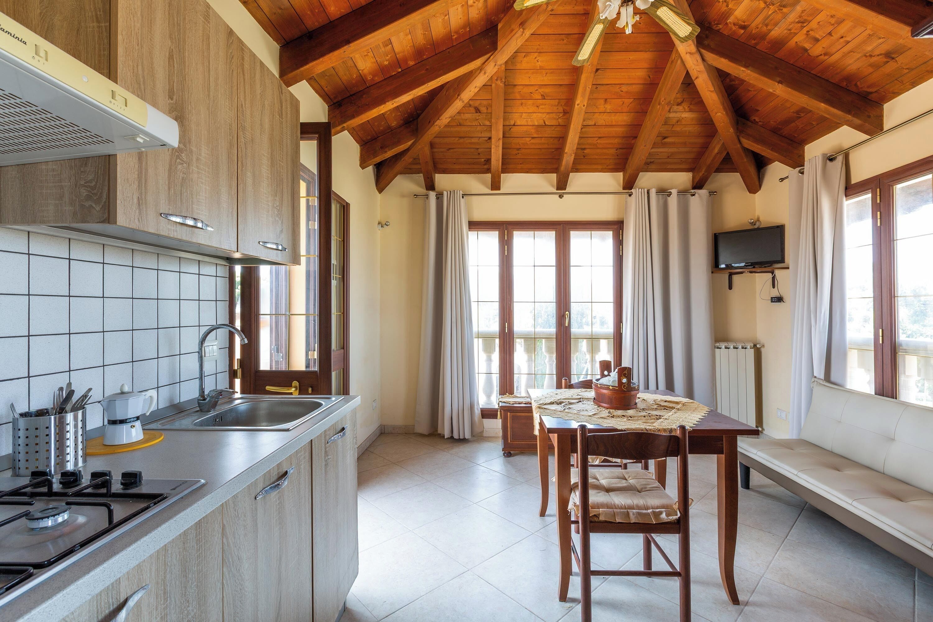 Fridge, coffee/tea maker, cookware/dishes/utensils