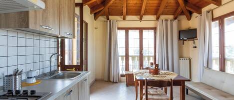 Fridge, coffee/tea maker, cookware/dishes/utensils