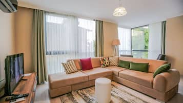 Deluxe Apartment, Balcony, Sea View | In-room safe, desk, soundproofing, iron/ironing board