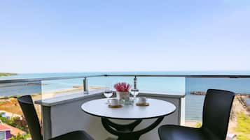 Deluxe Apartment, Balcony, Sea View | In-room safe, desk, soundproofing, iron/ironing board