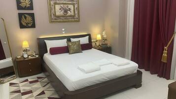 Tabla de planchar con plancha, Internet, ropa de cama