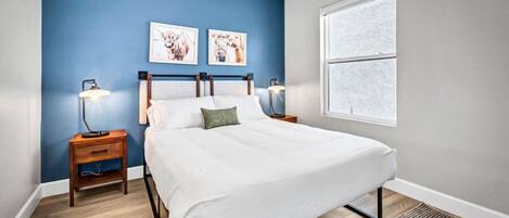 1 bedroom, desk, iron/ironing board, travel cot