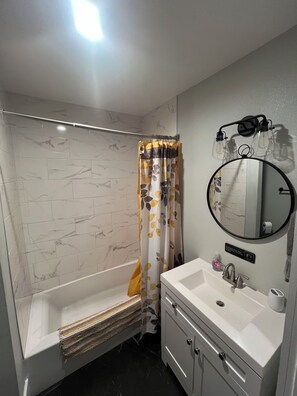 Hair dryer, towels, soap, shampoo
