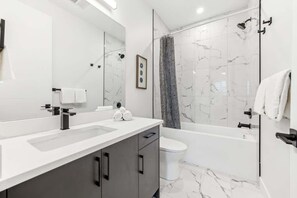 Shower, hair dryer - Two King Suites, Near Transit LRT, Garage, Balcony (Calgary)