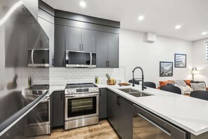 Fridge, microwave, oven, stovetop - Steps to Transit • Bright Kitchen • Parks & Shops (Calgary)