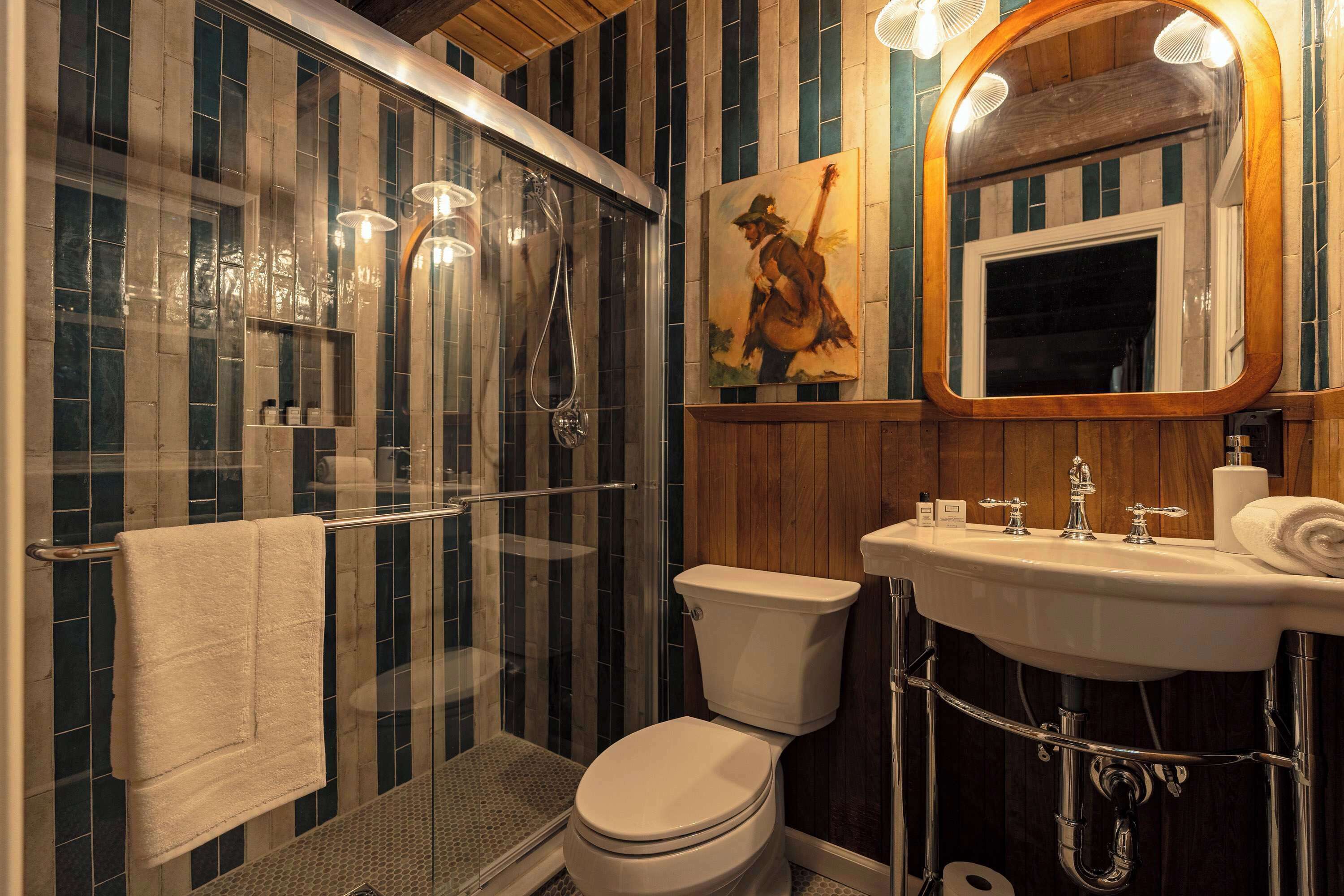 Shower, hair dryer, towels, shampoo