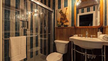 Shower, hair dryer, towels, shampoo