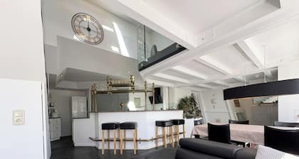 15 min. from Lake Constance, spacious loft apartment, roof terrace, pet-friendly