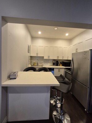 Private kitchen - Downtown City Apartment (2–3 Guests) (Bowmanville)