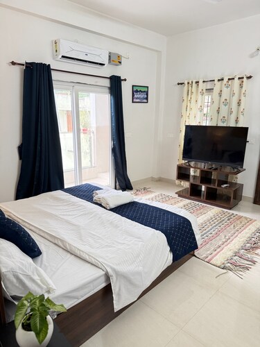 A modern, artsy 2BHK with a splash of boho charm.