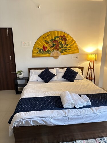 A modern, artsy 2BHK with a splash of boho charm.