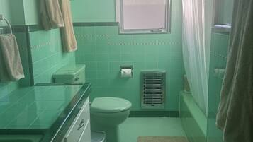 Hair dryer, towels, soap, shampoo