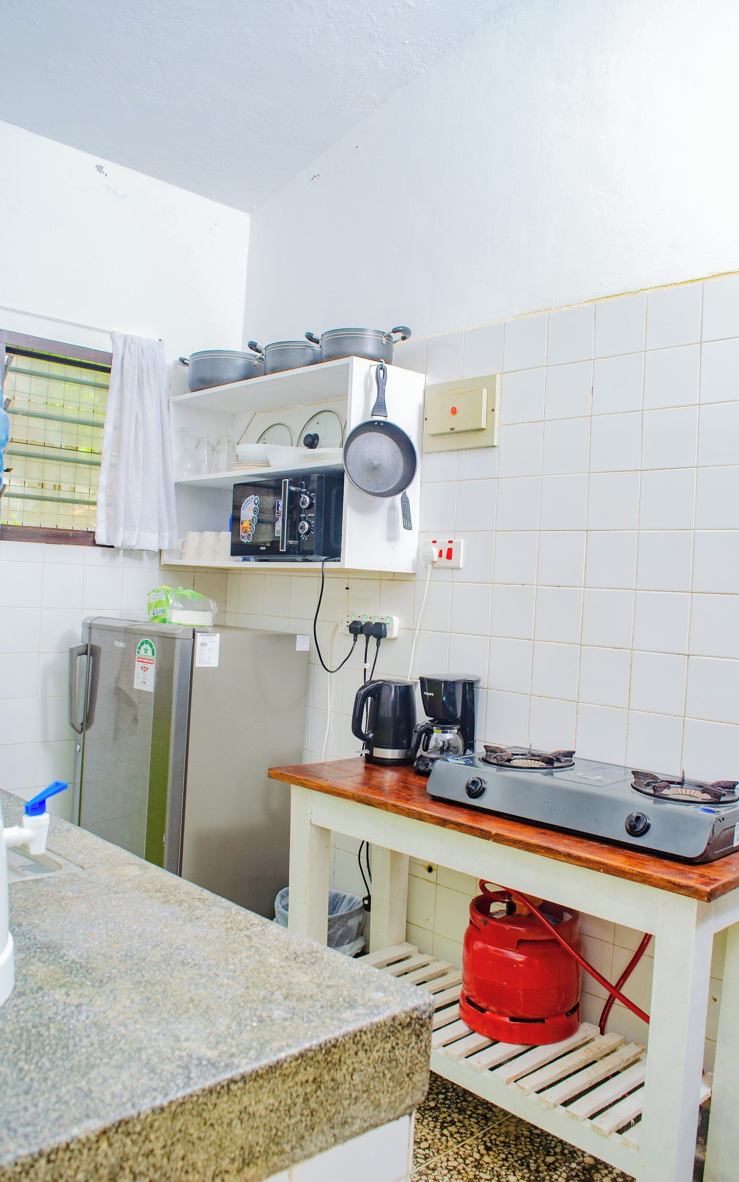 Fridge, microwave, stovetop, electric kettle