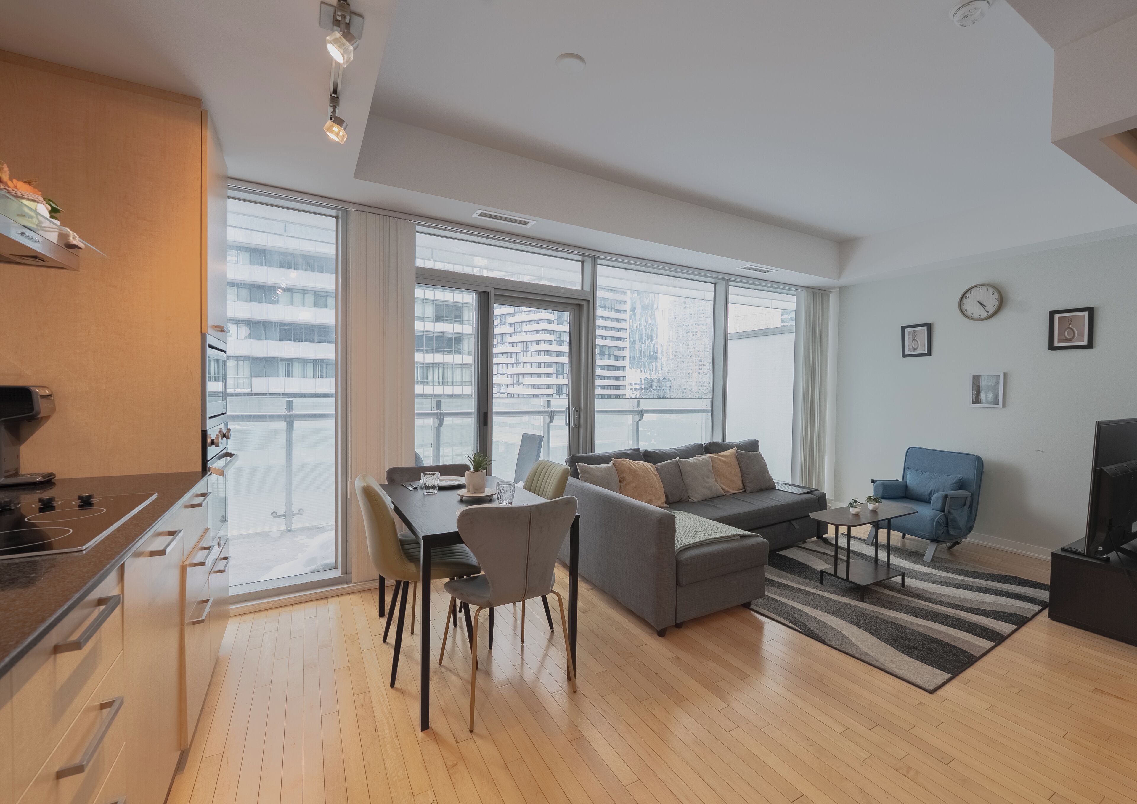 Deluxe Double Room, Balcony, City View | Living area | 60-inch LED TV with cable channels