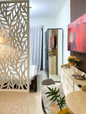Iron/ironing board, bed sheets - Warm Retreat with Balcony at Shore 2 Residences (Pasay City)