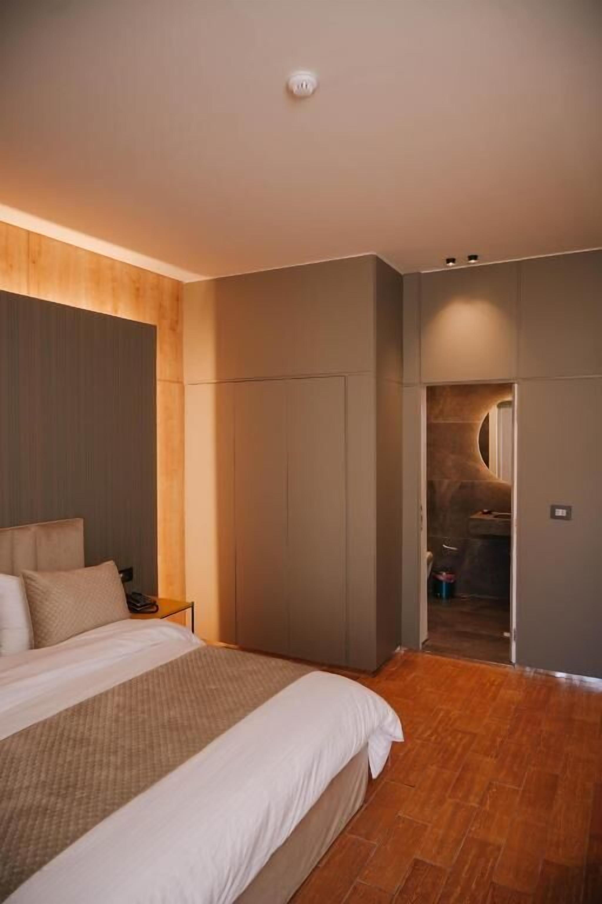 Suite, Balcony, Pool View | In-room safe, soundproofing, iron/ironing board, wheelchair access