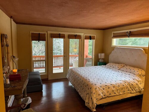 Cozy Riverside Retreat w/ Garden, Beach Access, Sauna. Pet + Family Friendly!