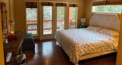 Cozy Riverside Retreat w/ Garden, Beach Access, Sauna. Pet + Family Friendly!