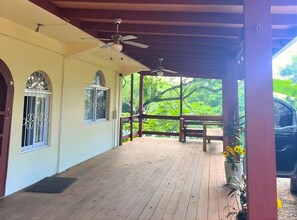 Terrace/patio - 4-bedroom villa in charming Sandy Bay with AC comfort (Sandy Bay)