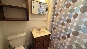 Hair dryer, towels, soap, toilet paper