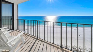 A balcony with a view of a beach and ocean. - Edgewater Tower 3-1003 (Panama City Beach)