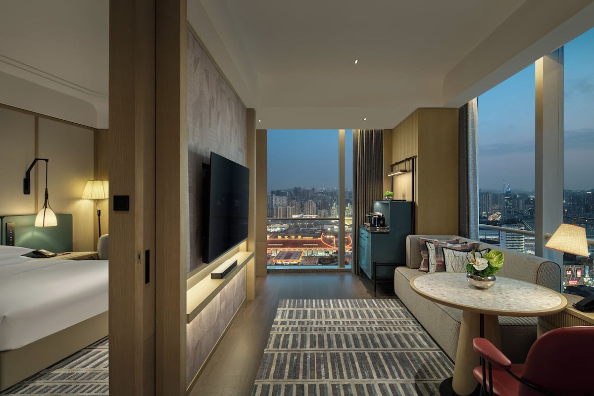 Premium bedding, down comforters, pillowtop beds, minibar