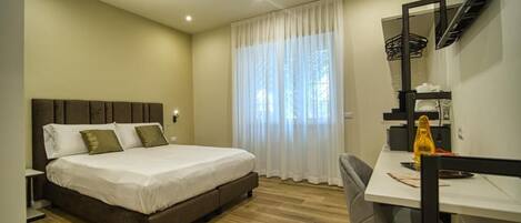 Habitación con 1 cama doble o 2 individuales, vistas al jardín | Escritorio, espacio para trabajar con un portátil, wifi gratis