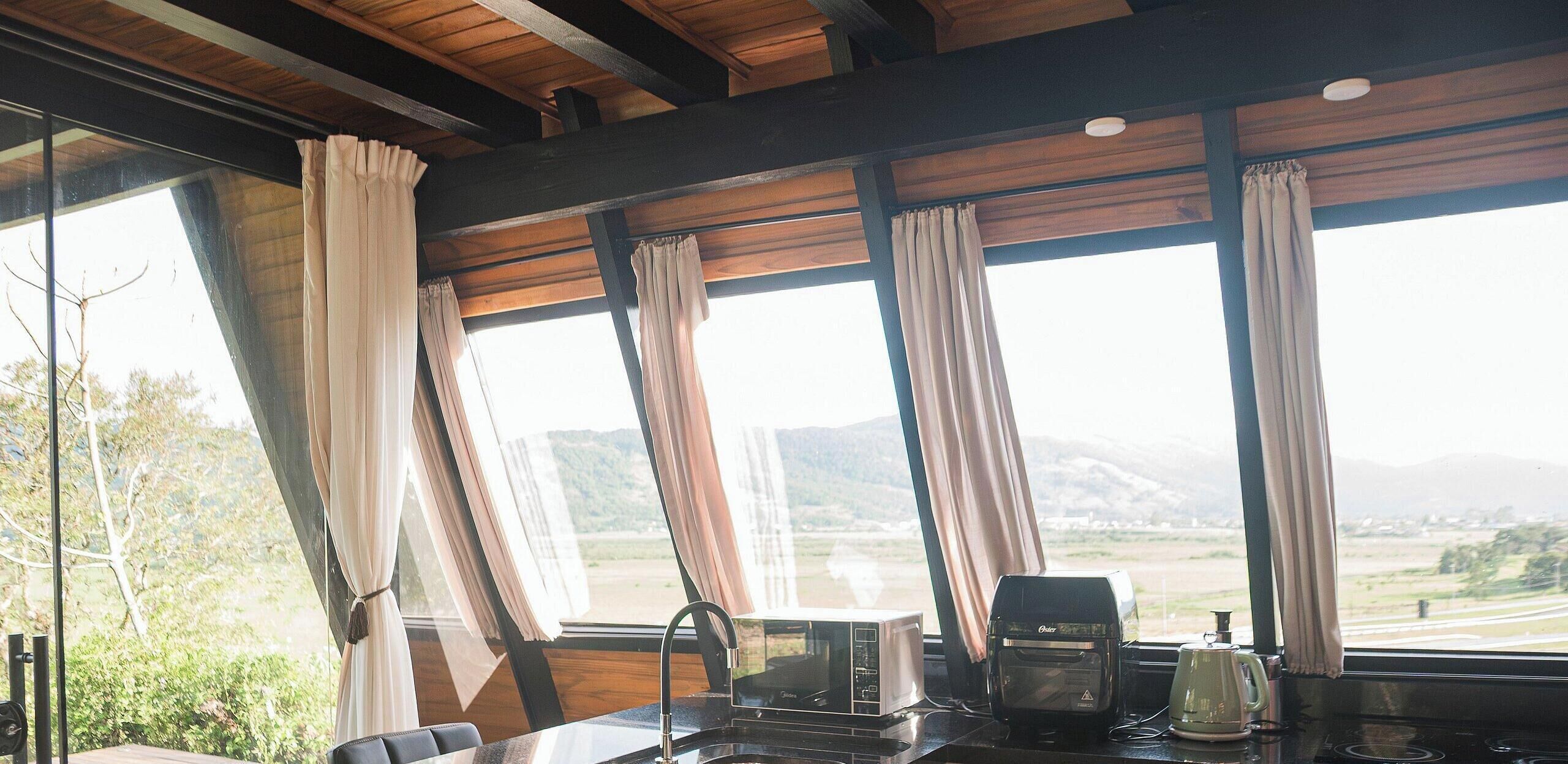 Romantic Chalet, Jetted Tub, Mountain View | Private kitchen | Microwave, cookware/dishes/utensils, dining tables