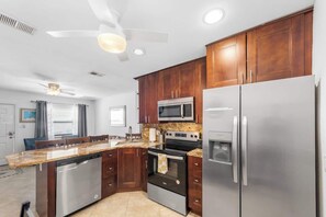 Fridge, microwave, oven, stovetop - Charming Beachside Retreat - Steps to the Beach! (Indian Rocks Beach)