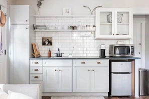 Fridge, microwave, stovetop, coffee/tea maker - The Little Black Cottage—Stylish, Hot Tub, FirePit, Lake Access! (Lake Lure)