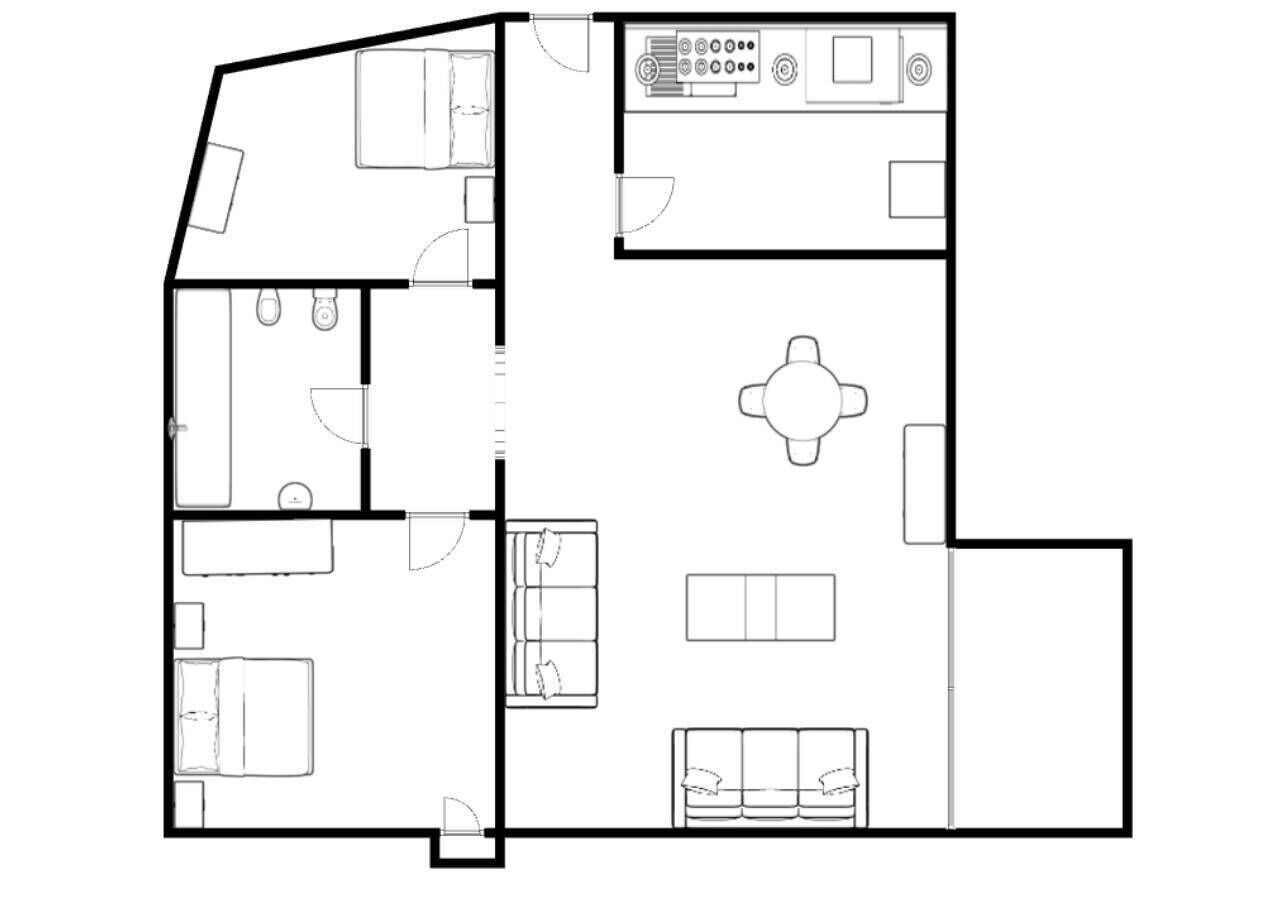 A floor plan with a kitchen, dining area, two bedrooms, a bathroom, and a living room.