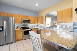 Fridge, microwave, oven, stovetop - Windsor Hills Fun 6BR Villa, Pool/Spa, By Disney (Kissimmee)