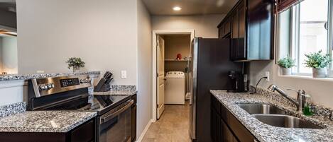 Coffee/tea maker, fridge, microwave, oven