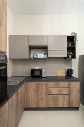 Appartamento, vista città | Cucina privata