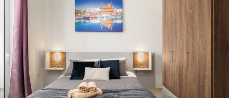 Apartment, City View | Blackout drapes, iron/ironing board, free WiFi