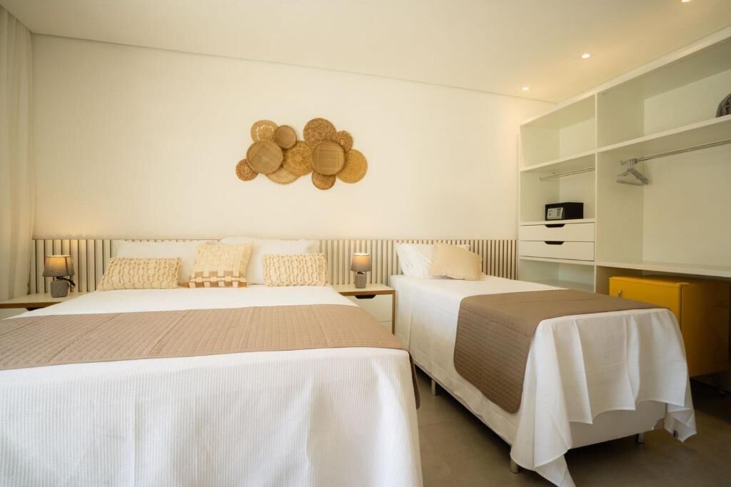 Deluxe Triple Room, Balcony, Partial Sea View | In-room safe, blackout curtains, free WiFi