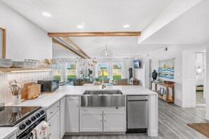 Fridge, microwave, oven, stovetop - Steps to Sand: Ground-Floor Condo with Patio, Private Beach Access & Pool! ☀️ (Satellite Beach)